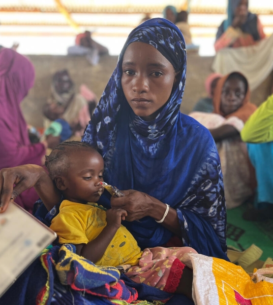 Mowada Moussa Yaya, a 22-year-old mother and Sudanese refugee, is waiting in line for treatment for her malnourished children at the health center that UNHCR, the UN Refugee Agency, is running in Iridimi settlement in Chad. She fled Sudan shortly after the conflict broke out and has been living in Iridimi for about two years. She has already lost one of her children to malnutrition and is now afraid that history will repeat itself.