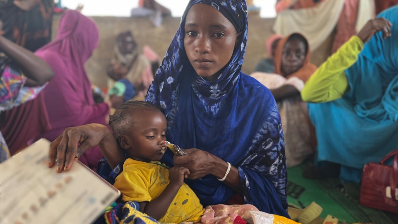 Mowada Moussa Yaya, a 22-year-old mother and Sudanese refugee, is waiting in line for treatment for her malnourished children at the health center that UNHCR, the UN Refugee Agency, is running in Iridimi settlement in Chad. She fled Sudan shortly after the conflict broke out and has been living in Iridimi for about two years. She has already lost one of her children to malnutrition and is now afraid that history will repeat itself.